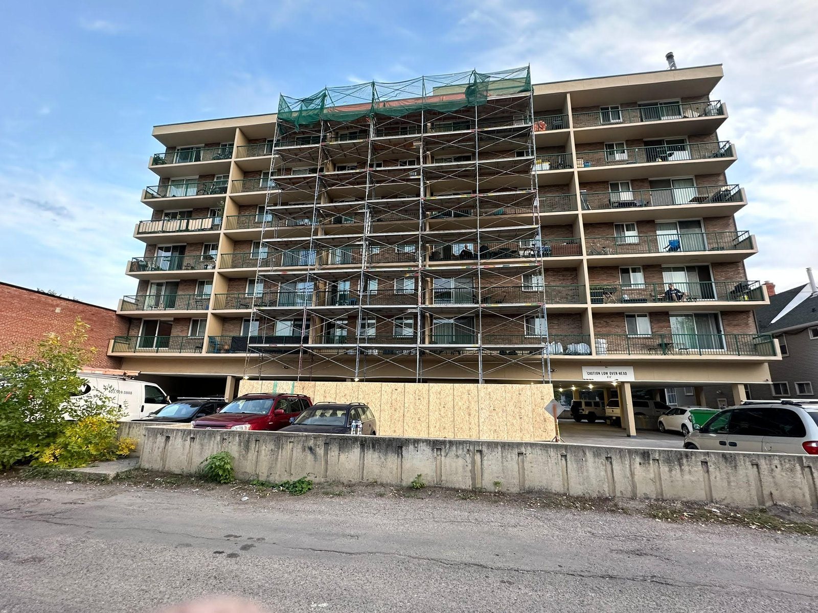 Weststar crew performing building envelope remediation on a multi-family building